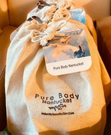 Discovery Sets in Organic Cotton Bags with Pure Body Nantucket Stamped and tag.