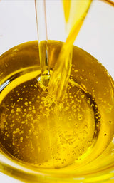 Nourishing Body Oil being blended.