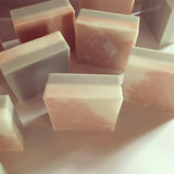 Grey Lady Soap is a coconut oil based soap with skin safe activated charcoal and rose clay. A blend of citrus oils and a hint of mint leave you with a subtle, refreshing aroma. Wrapping for soap not shown. 