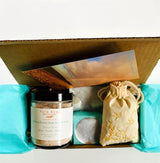 Gift Box showing Island Rose Bath & Foot Soak, Little Grey Lady Soap, Wrapped Lip Conditioner and Sweet Dreams Sleep Sachet. 